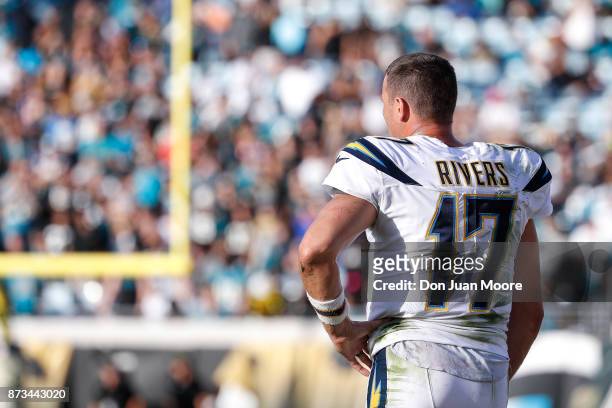Backview Quarterback Philip Rivers of the Los Angeles Chargers on the sidelines during the game against the Jacksonville Jaguars at EverBank Field on...