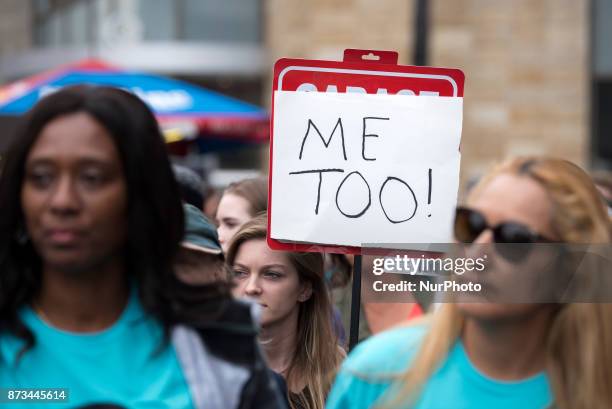 Protesters attend a Me Too rally to denounce sexual harassment and assaults of women in Los Angeles, California on November 12, 2017. The rally is...