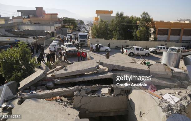Collapsed buildings are seen in Derbendihan district of Sulaymaniyah, Iraq on November 13, 2017 following a 7.3 magnitude earthquake that hit the...