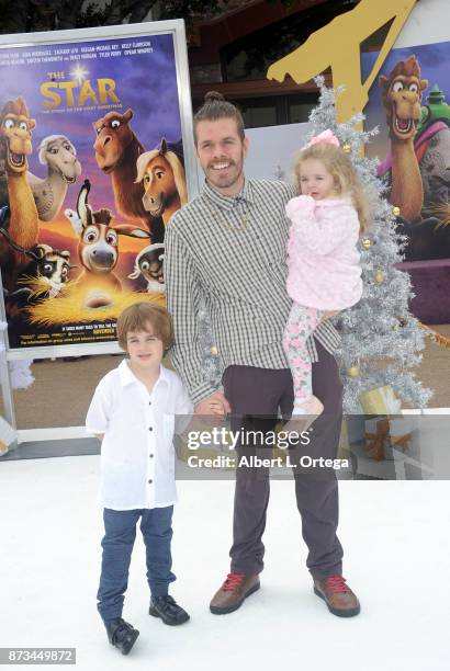 Mario Armando Lavandeira III, Blogger Perez Hilton and Mia Alma Lavandeira arrive for the Premiere Of Columbia Pictures' "The Star" held at Regency...