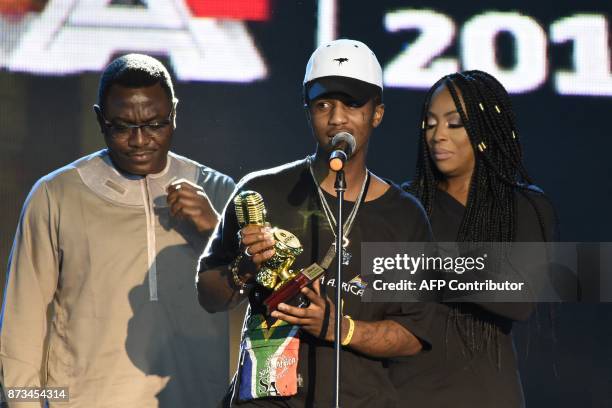 Recipient of the of Best Southern African Best Male Artist, South African rap singer Emtee speaks during the All Africa Music Awards in Lagos on...