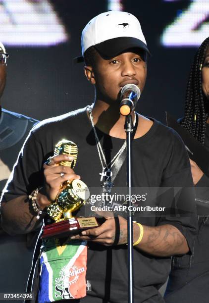 Recipient of the of Best Southern African Best Male Artist, South African rap singer Emtee speaks during the All Africa Music Awards in Lagos on...