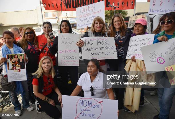 Tess Rafferty, Lauren Sivan and Cathy Schulman pose at the Take Back The Workplace March on November 12, 2017 in Hollywood, California.