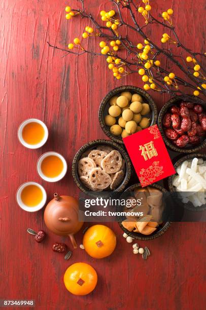 flat lay chinese new year food and drink still life. - lunar new year cup 2017 stock-fotos und bilder