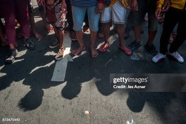 Protesters march the streets of Manila during the start of the ASEAN meetings between heads of state on November 13, 2017 in Manila, Philippines....