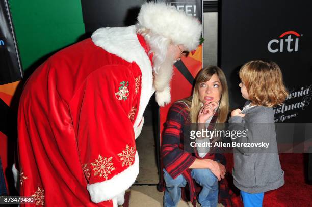 Actress Jaime King and son James Knight Newman pose for pictures with Santa Claus at A California Christmas at The Grove Presented by Citi on...