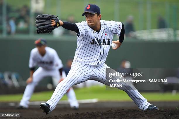 Shogo Noda of Samurai Japan throws a pitch during a practice game between Japan and Saitama Seibu Lions at Sokken Stadium on November 13, 2017 in...