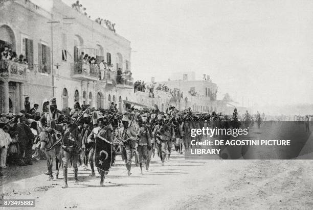 General Cassinis' column, returning from the Battle of Agilat with the spoils of war, Tripoli, Libya, from L'Illustrazione Italiana, Year XLIV, No...