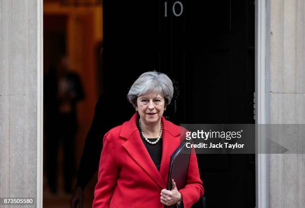 British Prime Minister Theresa May leaves Number 10 Downing Street on November 13, 2017 in London, England. Mrs May is to hold a meeting with...