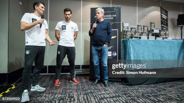 Nicklas Dietrich and Yann-Benjamin Kugel , fitness coaches of Germany, hold a speech to present their book 'Fit wie die Mannschaft' at Hyatt Hotel on...