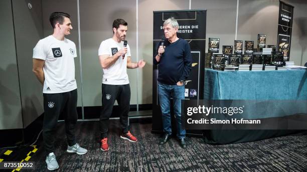 Nicklas Dietrich and Yann-Benjamin Kugel , fitness coaches of Germany, hold a speech to present their book 'Fit wie die Mannschaft' at Hyatt Hotel on...