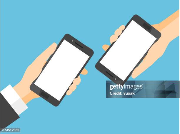 two smartphones with blank white screen - smartphone in hand stock illustrations
