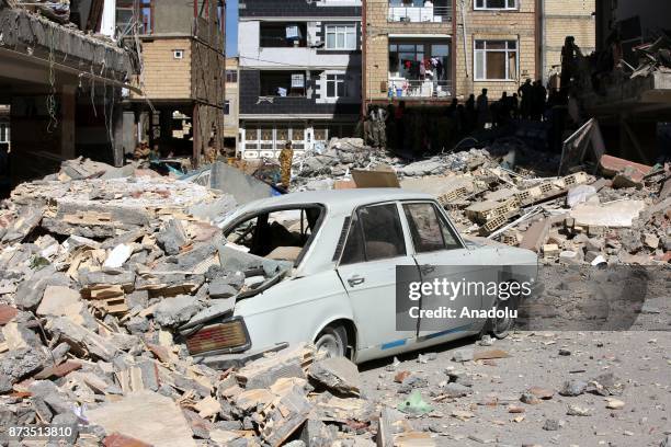 Car is trapped under the rubble in Sarpol-e Zahab town of Kermanshah, Iran on November 13, 2017 following a 7.3 magnitude earthquake that hit the...