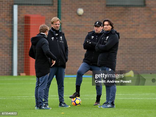 Jurgen Klopp manager of Liverpool Zeljko Buvac first assistant coach of Liverpool and Peter Krawietz second assistant coach during a training session...