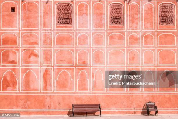 painted pink wall of jaipur city palace, rajasthan, india - rajasthan stock pictures, royalty-free photos & images
