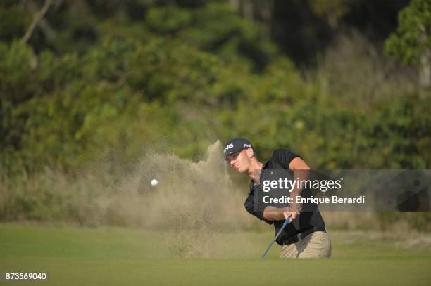 Henry Todd of the United States hits from bunker on the 14th hole during the third round of the PGA TOUR Latinoamerica 64 Aberto do Brasil at the...