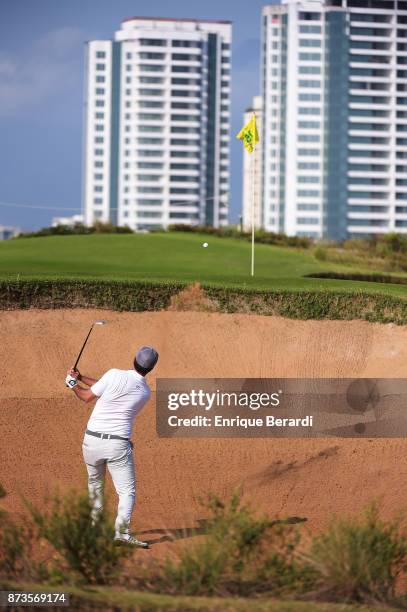 Oscar Fraustro of Mexico hits out of a bunker on the 15th hole during the third round of the PGA TOUR Latinoamerica 64 Aberto do Brasil at the...