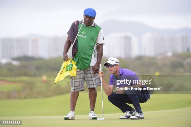 Michael Buttacavoli of the United States lines up a putt on the 18th hole during the final round of the PGA TOUR Latinoamerica 64 Aberto do Brasil at...