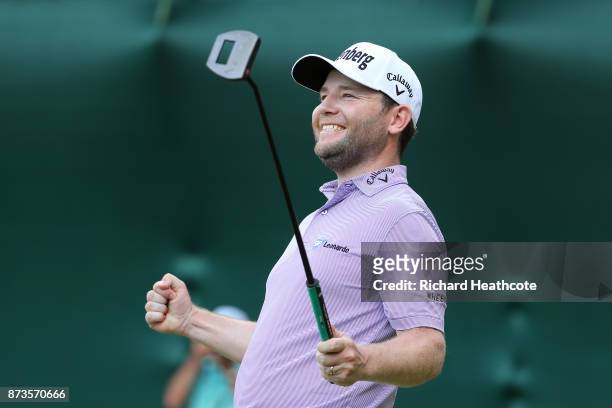 Branden Grace of South Africa celebrates as he holes the winning putt to secure victory during the final round of the 2017 Nedbank Golf Challenge at...