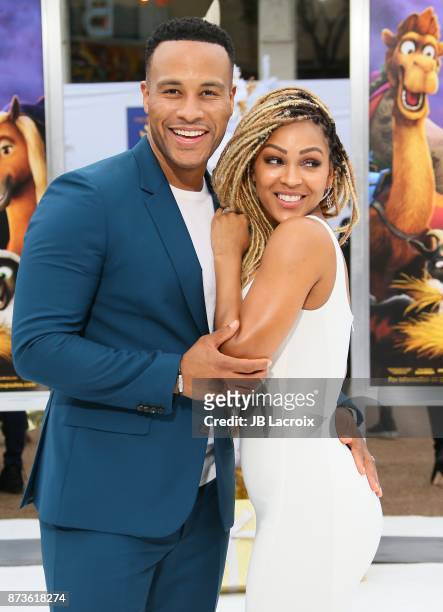 DeVon Franklin and Meagan Good attend the premiere of Columbia Pictures' 'The Star' on November 12, 2017 in Los Angeles, California.