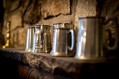 Traditional pewter tankard in a traditional English pub