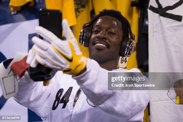 Pittsburgh Steelers wide receiver Antonio Brown takes a selfie with a fan before the NFL game between the Pittsburgh Steelers and Indianapolis Colts...