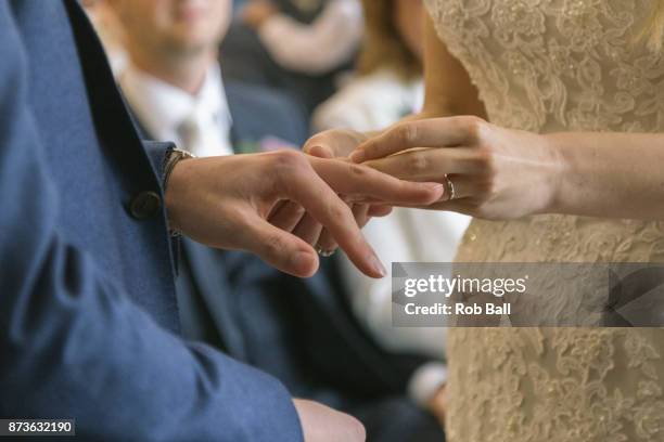 wedding rings - wedding ceremony alter stock pictures, royalty-free photos & images