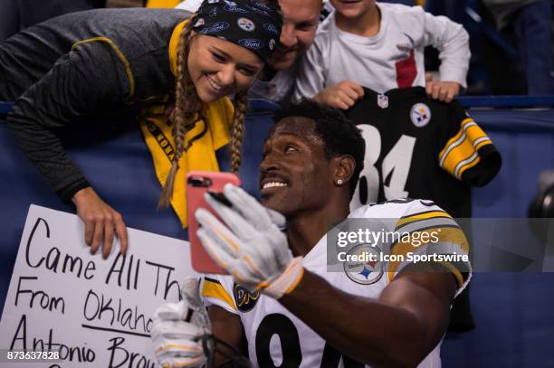 Pittsburgh Steelers wide receiver Antonio Brown talks a selfie with a fan after the NFL game between the Pittsburgh Steelers and Indianapolis Colts...