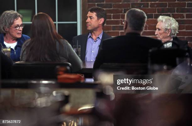 Supporters of President Donald Trump participate in a roundtable discussion on the first year of the Trump presidency hosted by CBS News at The...