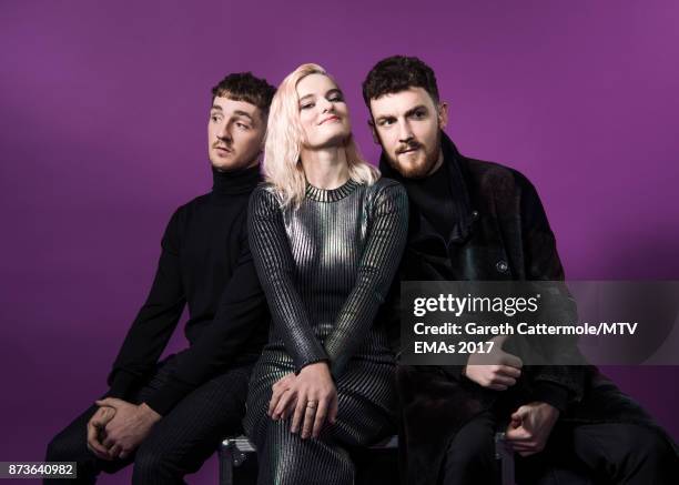 Luke Patterson, Grace Chatto and Jack Patterson of Clean Bandit pose in the Studio during the MTV EMAs 2017 held at The SSE Arena, Wembley on...