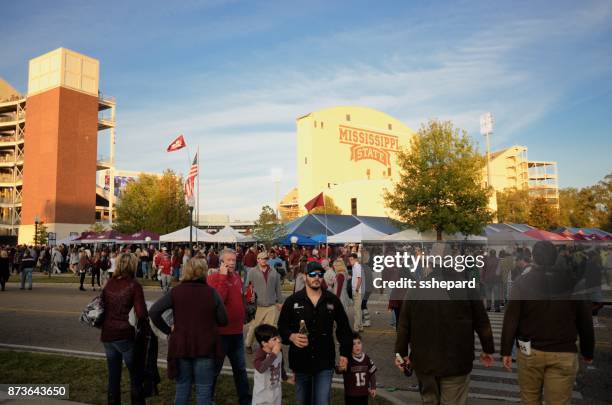 tailgating near the stadium - starkville stock pictures, royalty-free photos & images