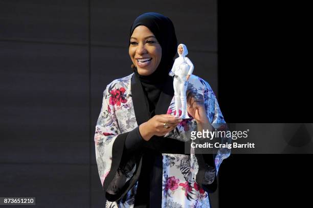 Olympic Medalist Ibtihaj Muhammad speaks onstage a new Barbie doll in her image during Glamour Celebrates 2017 Women Of The Year Live Summit at...