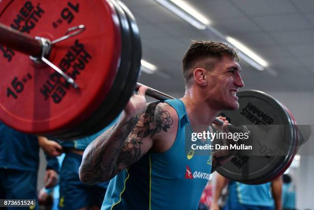 Sean McMahon of Australia lifts weights during a training session at the Lensbury Hotel on November 13, 2017 in London, England.