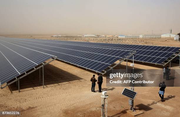 General view shows part of a new 15 million euro solar plant, funded by the German government, that emits some 12.9 megawatts during its official...