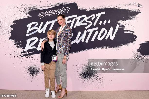 Beckett Mazeau and Woman of the Year 2012 and former president and executive creative director of the J.Crew Group Jenna Lyons pose during Glamour...