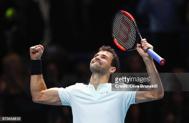 Grigor Dimitrov of Bulgaria celebrates victory in his Singles match against Dominic Thiem of Austria during day two of the Nitto ATP World Tour...