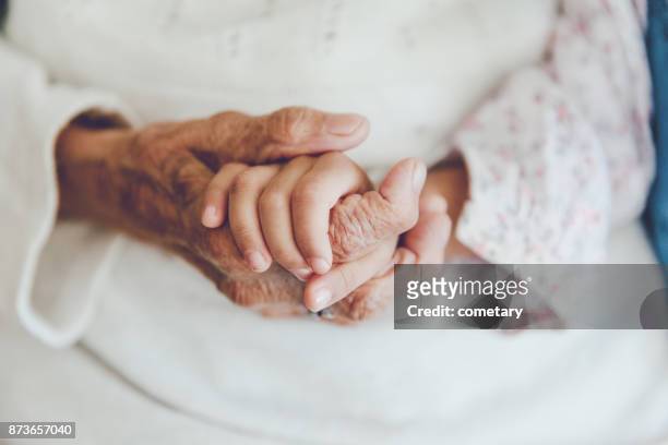 senior women and girl - 109 stock pictures, royalty-free photos & images