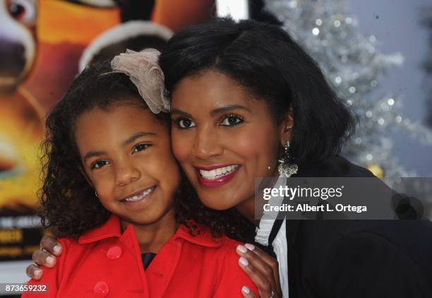 Actress Denise Boutte and daughter arrive for the Premiere Of Columbia Pictures' "The Star" held at Regency Village Theatre on November 12, 2017 in...