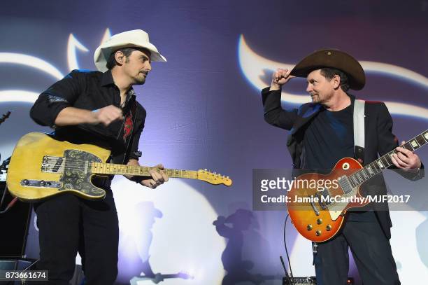 Brad Paisley and Brad Paisley perform on stage at A Funny Thing Happened On The Way To Cure Parkinson's benefitting The Michael J. Fox Foundation at...