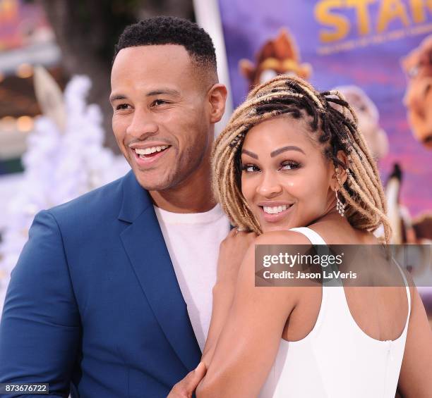 Producer DeVon Franklin and actress Meagan Good attend the premiere of "The Star" at Regency Village Theatre on November 12, 2017 in Westwood,...