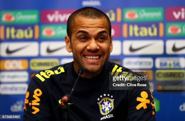 Dani Alves of Brazil speaks during a Brazil Press Conference ahead of the International Friendly Match between England and Brazil on November 13,...