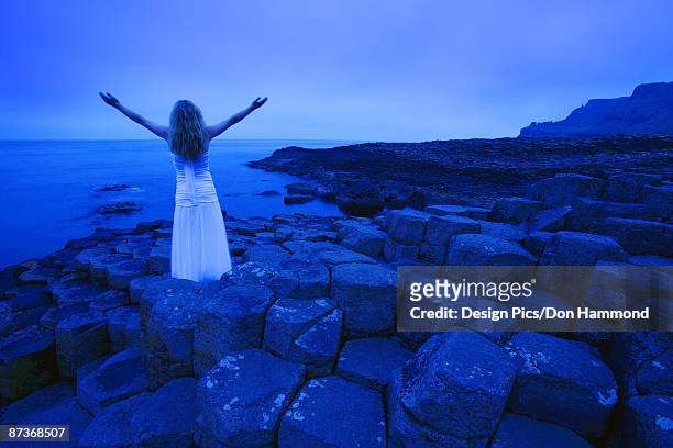 woman with arms raised - design pics don hammond stock pictures, royalty-free photos & images