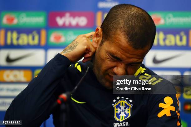 Dani Alves of Brazil speaks during a Brazil Press Conference ahead of the International Friendly Match between England and Brazil on November 13,...