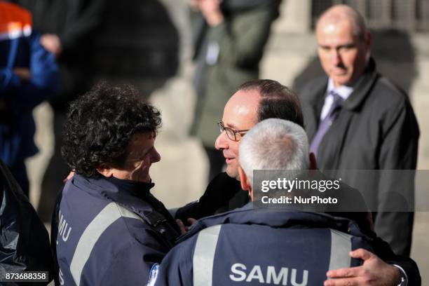 Former French President Francois Hollande attends a ceremony at Paris 11th district town hall, France, November 13 during ceremonies held for the...