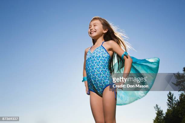asian girl in bathing suit with scarf - summer super 8 stockfoto's en -beelden