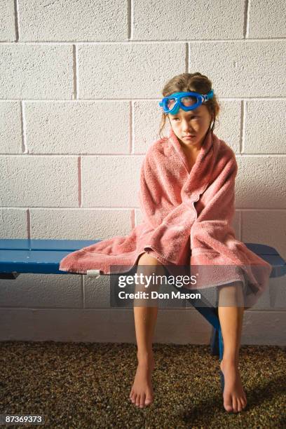 sad asian girl in towel and goggles - camarins - fotografias e filmes do acervo