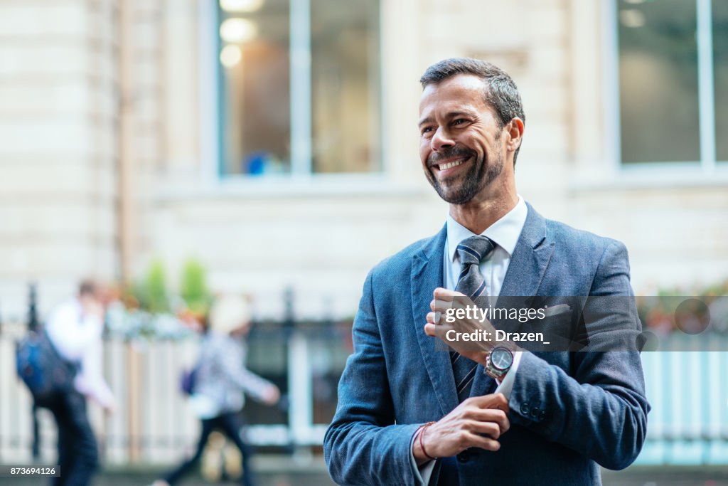 Successful business person expressing positive emotion