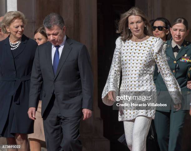 The President of Colombia Juan Manuel Santos Calderon and his wife Maria Clemencia Rodriguez Munera walk out of Jeronimos Monastery on November 13,...