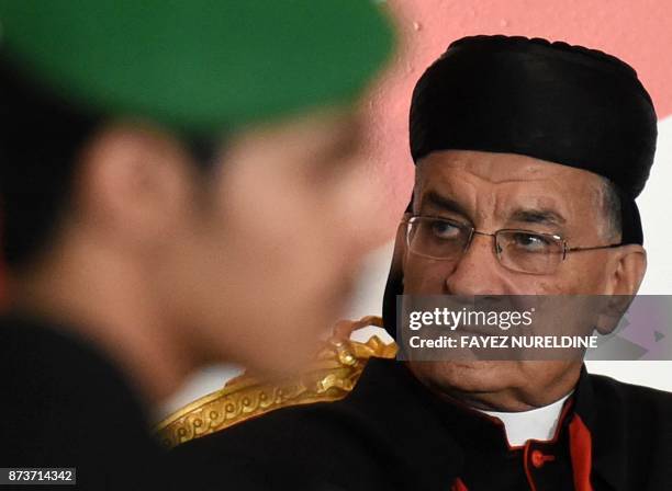 Lebanese Maronite Patriarch Mar Bechara Boutros al-Rahi looks on during a meeting with the Lebanese community living in Saudi Arabia at Lebanon's...