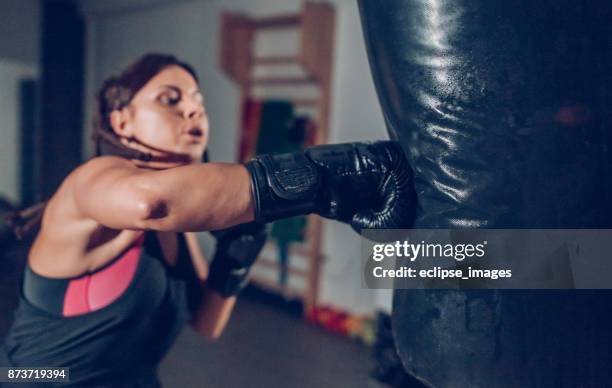 boxing women - kickboxing equipment stock pictures, royalty-free photos & images